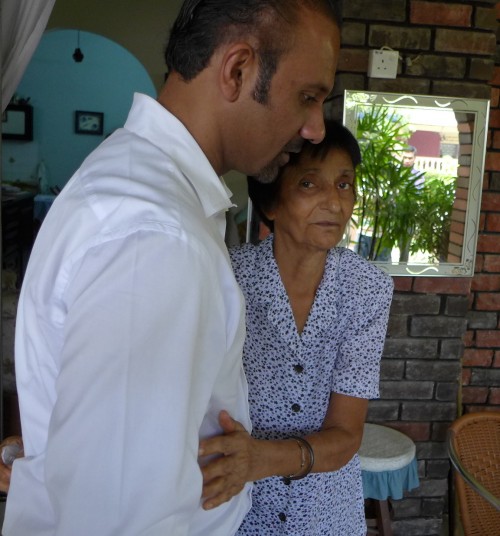 Ramkarpal giving Sanjid Singh' mother a hug to comfort her.