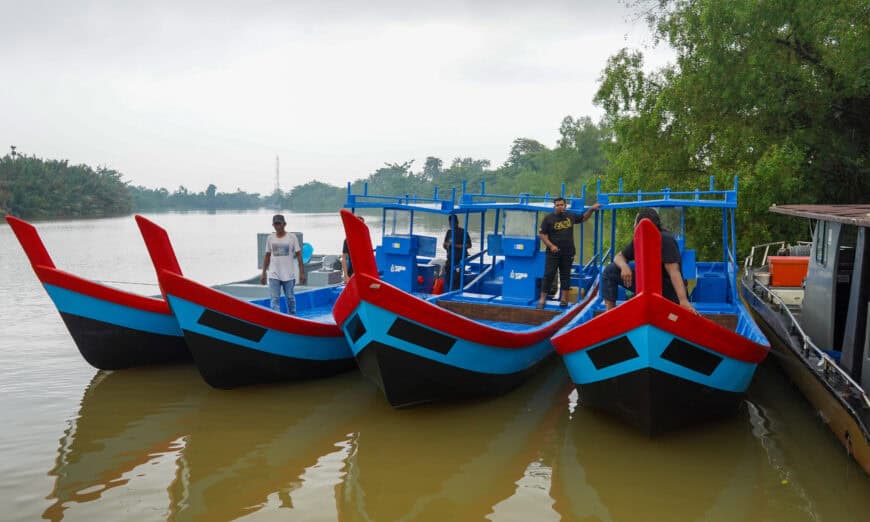 the fisherman getting ready to test their boats during the boat and engine handover ceremony in nibong tebal.